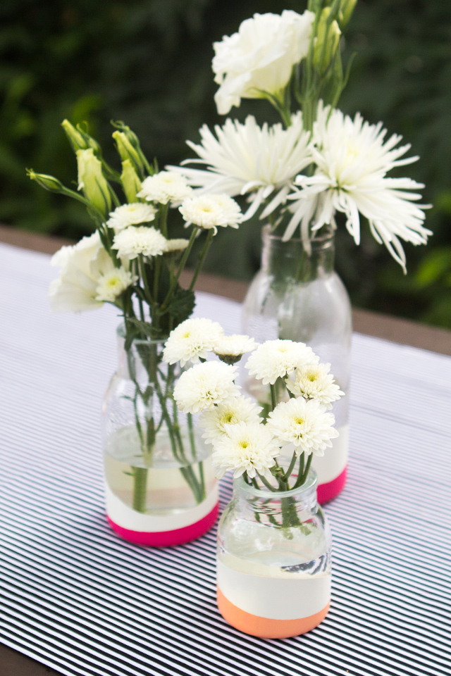 These DIY vases look paint dipped but they're not! Learn how to use balloons to create a similar look without the mess.